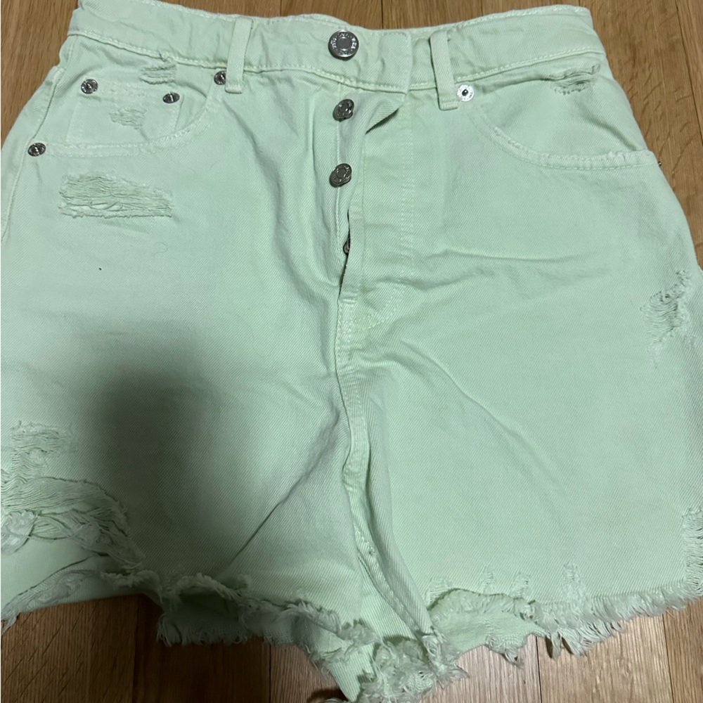 Green denim shorts